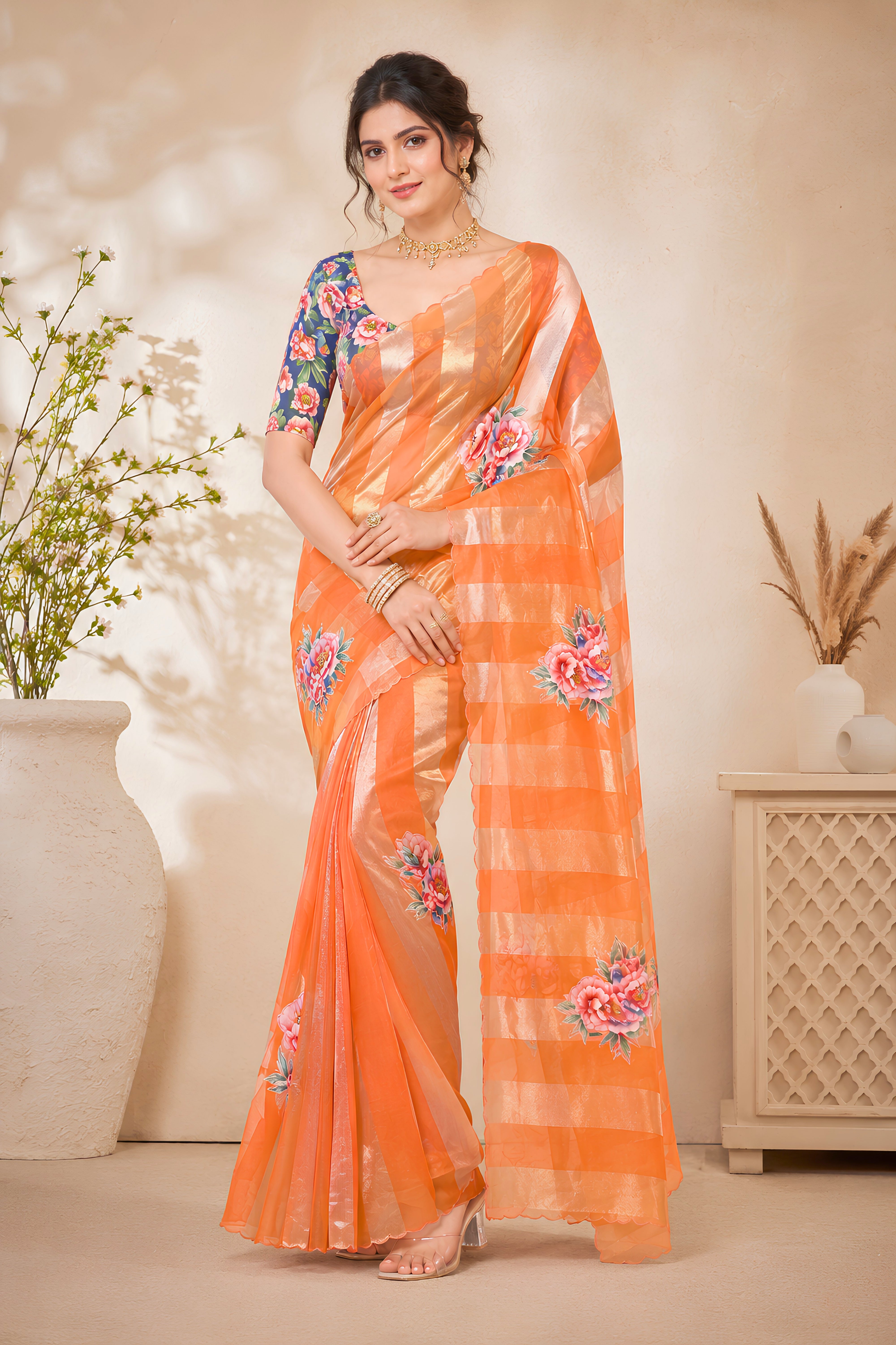 Vibrant Orange Organza Zari Stripe Saree with Floral Applique
