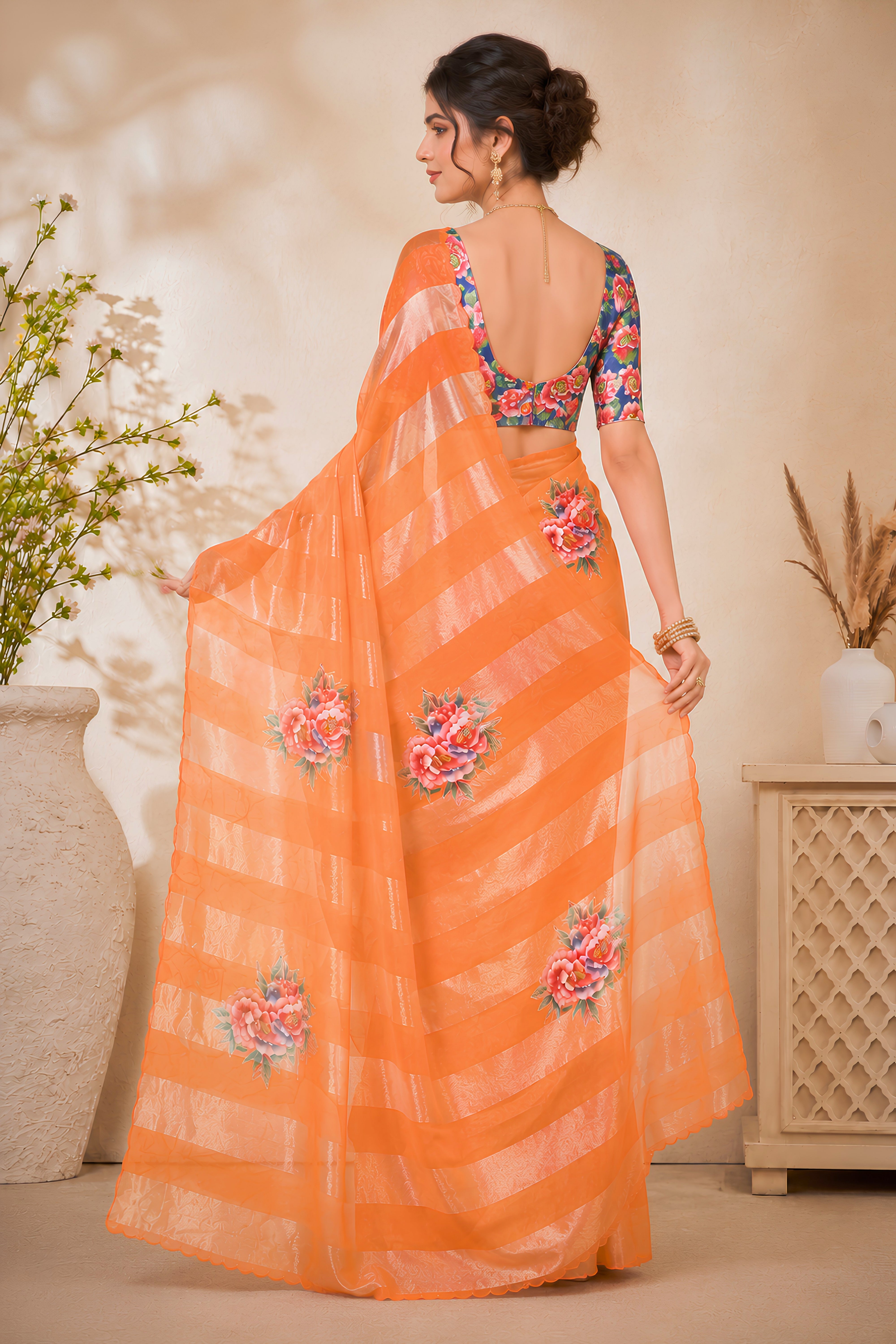 Vibrant Orange Organza Zari Stripe Saree with Floral Applique