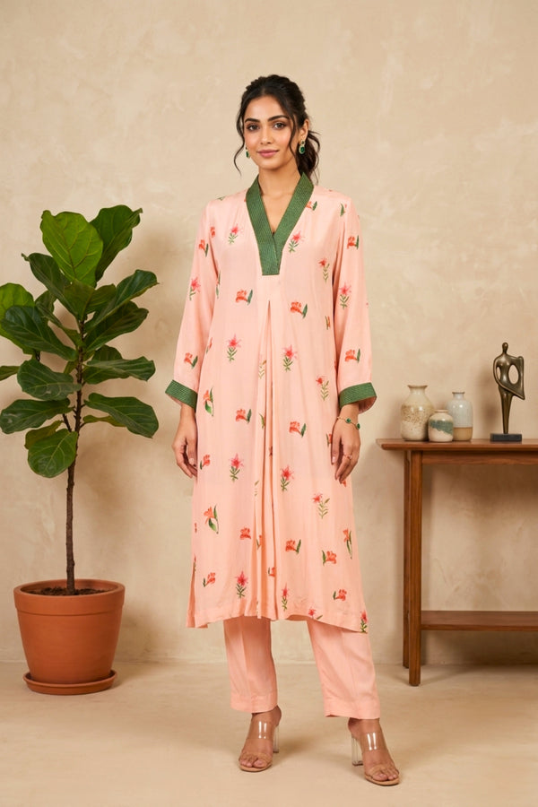 Elegant Peach Floral Printed Crepe Kurti with Contrast Green Neckline