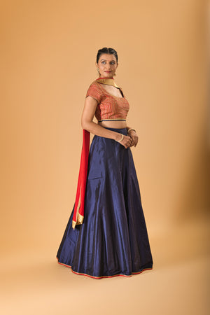 Striking Red Embellished Blouse with Navy Blue Silk Lehenga and Red Dupatta
