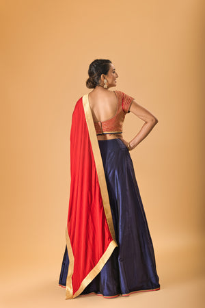 Striking Red Embellished Blouse with Navy Blue Silk Lehenga and Red Dupatta