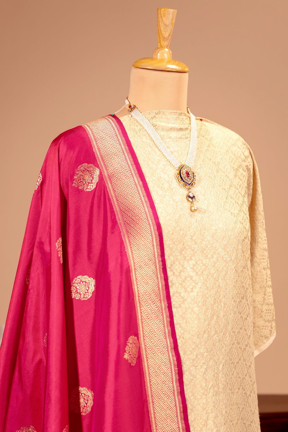 Cream Bandhani Georgette Unstitched Suit Set with Magenta Banarasi Silk Dupatta by Label Tamanna