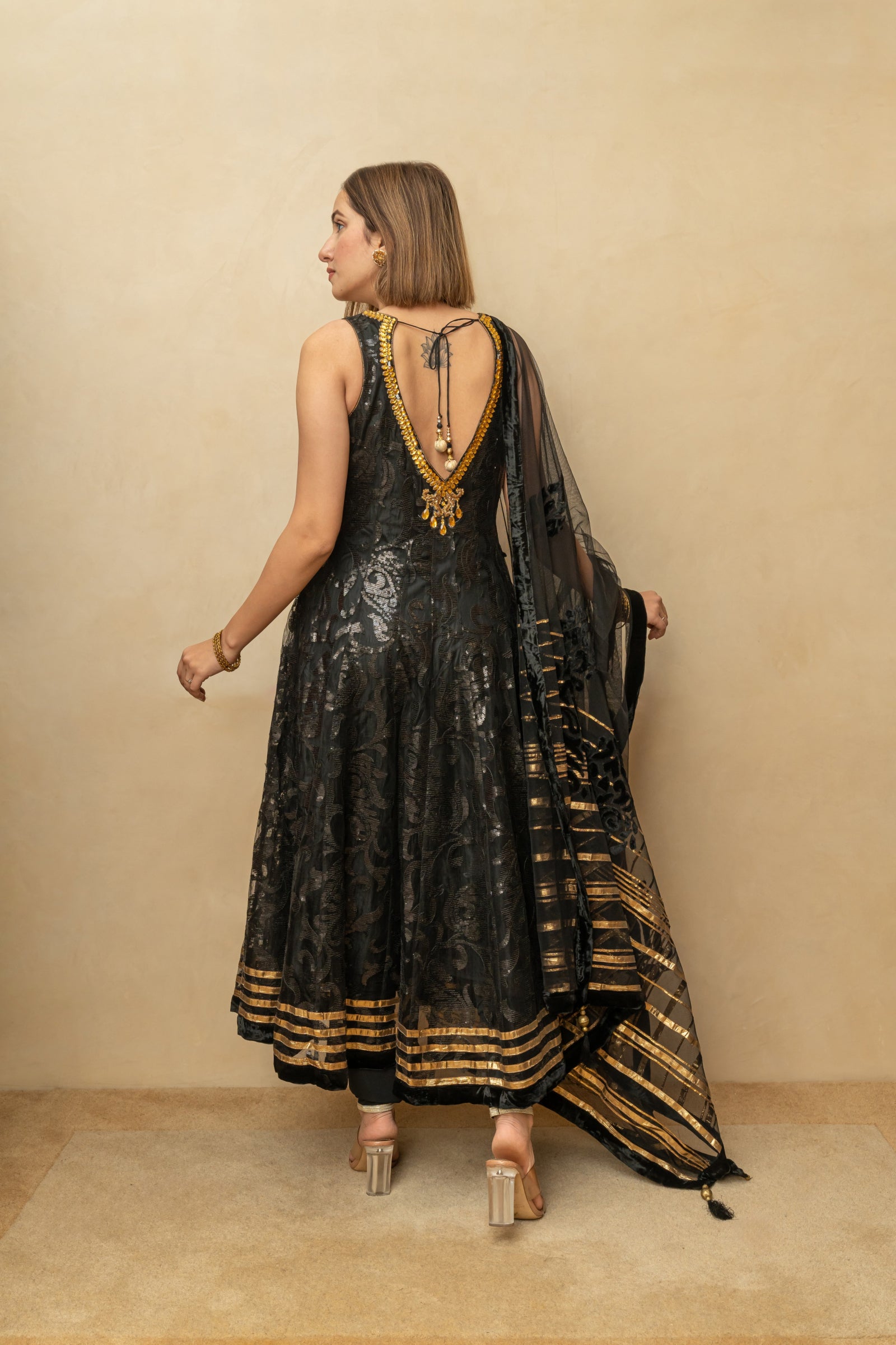 Black and gold self sequence work anarkali suit set