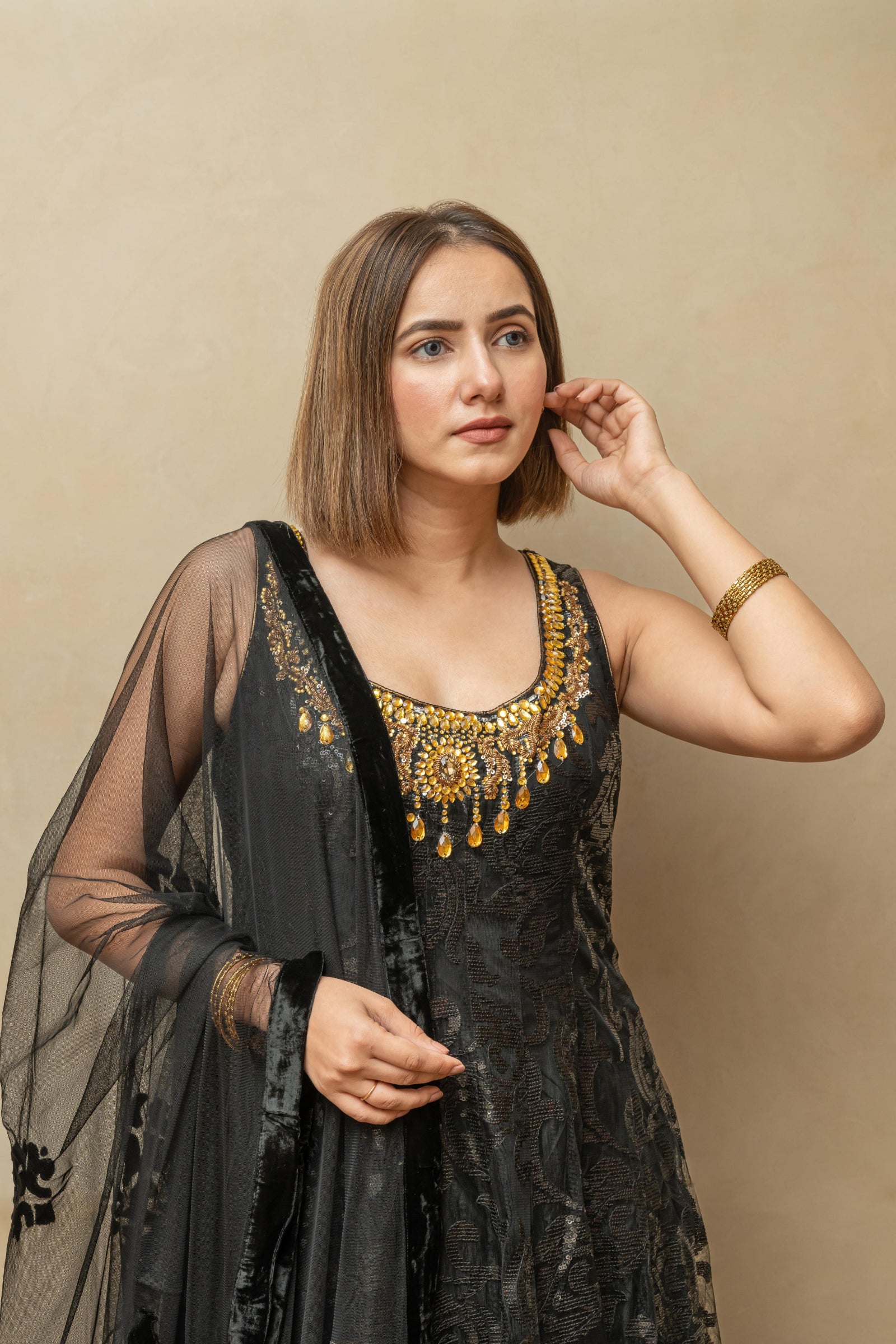 Black and gold self sequence work anarkali suit set