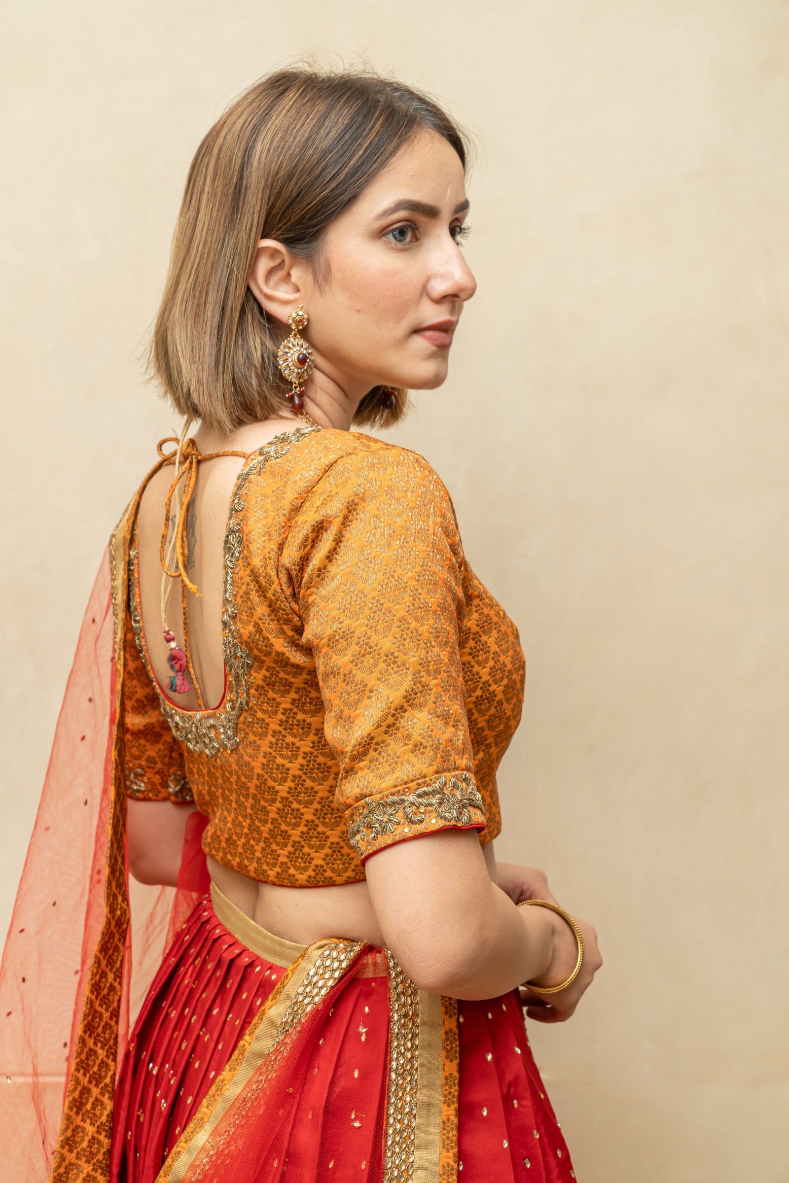Orange and red silk lehenga set
