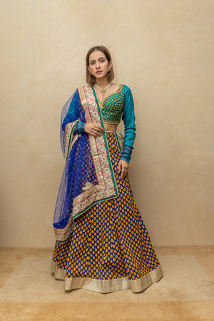 Contemporary Rama green and royal blue silk lehenga set