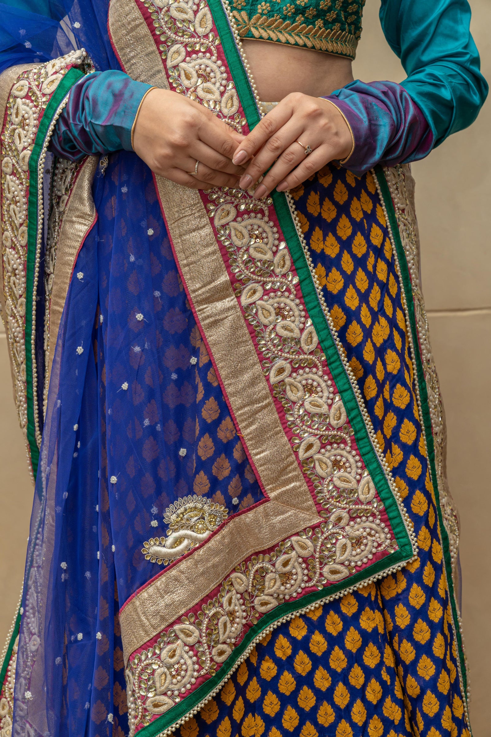 Contemporary Rama green and royal blue silk lehenga set