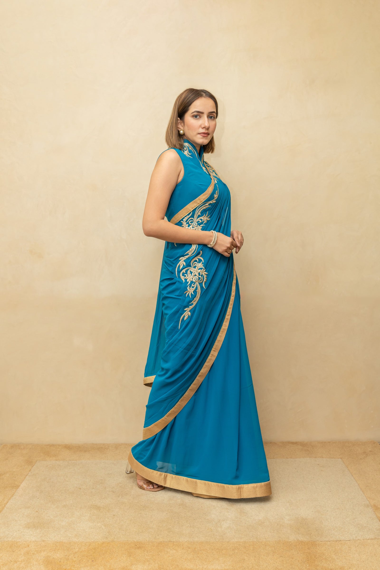 Peacock blue pre draped georgette saree and blouse set