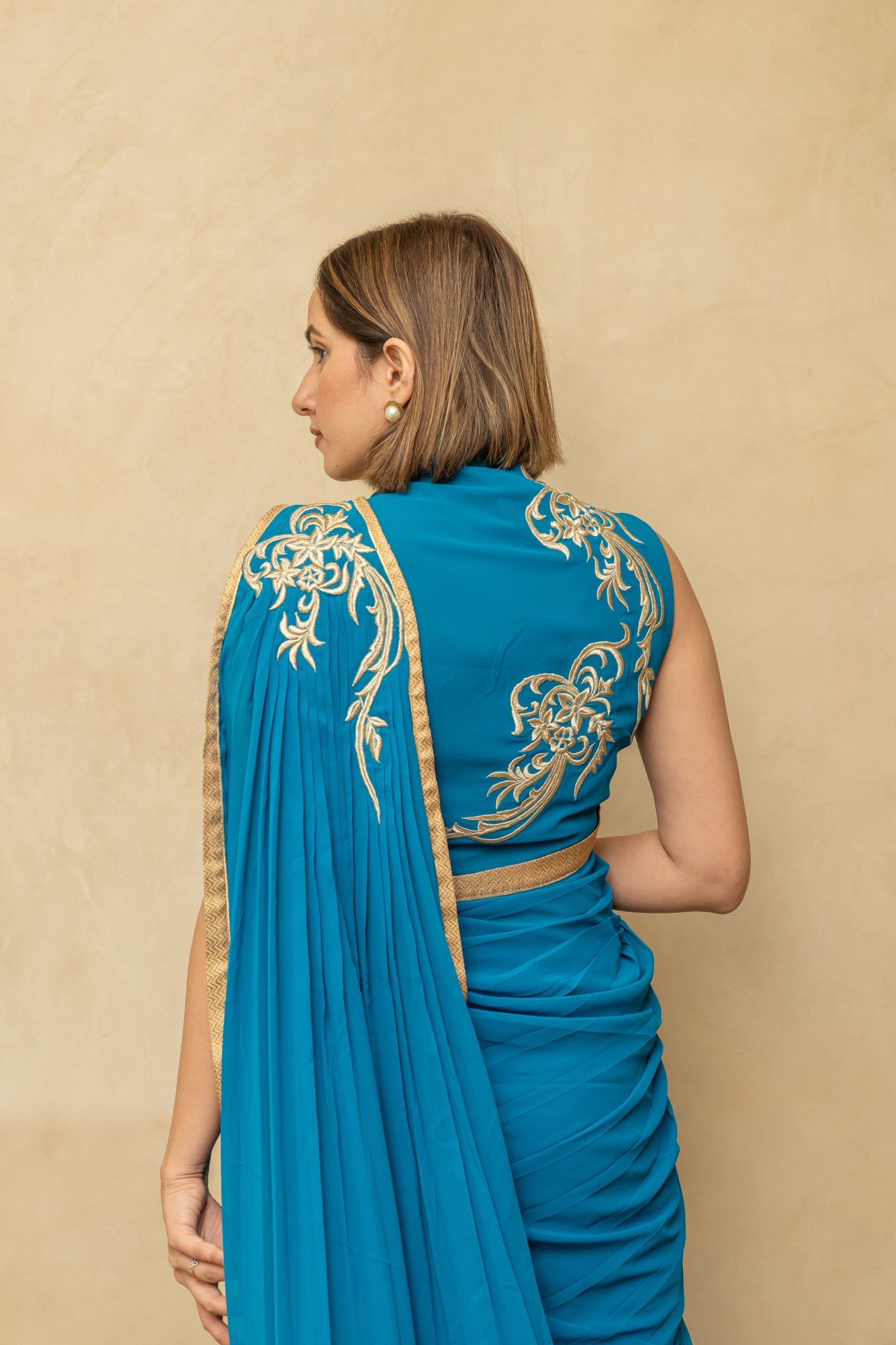 Peacock blue pre draped georgette saree and blouse set