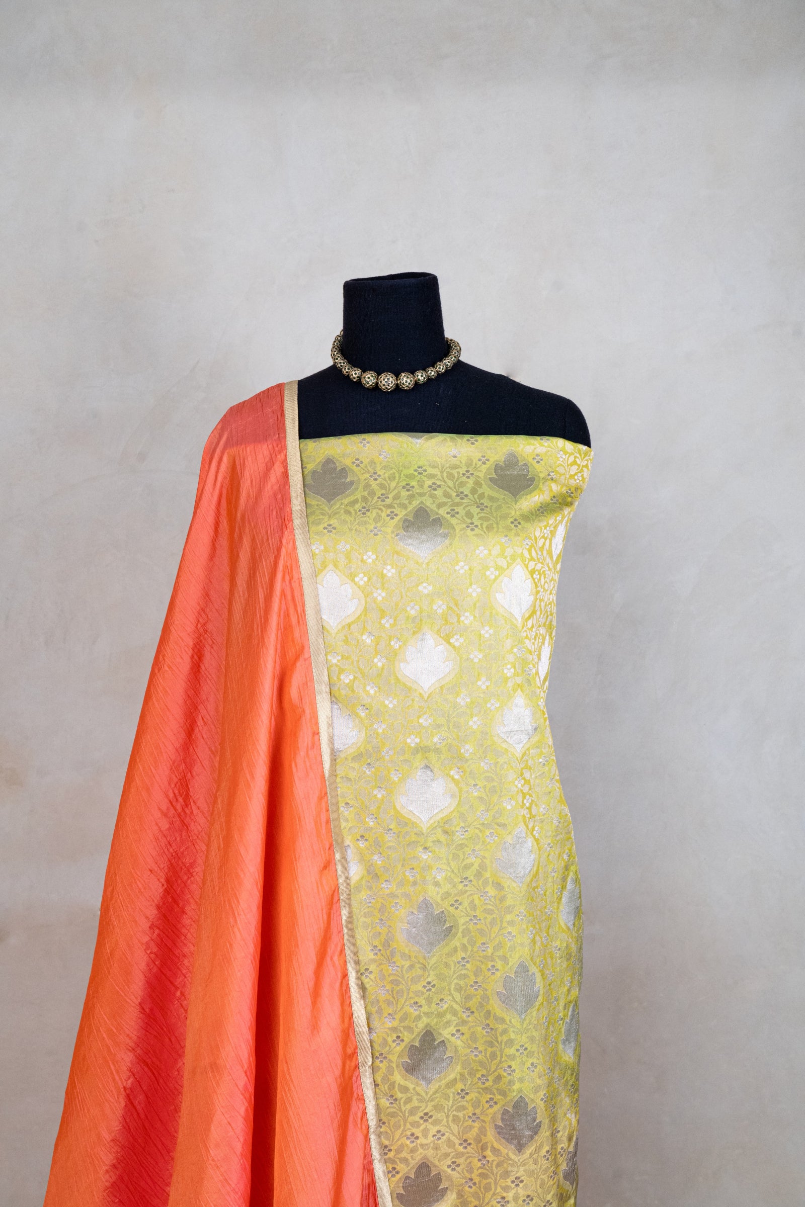 Parrot green and orange banarasi silk suit set
