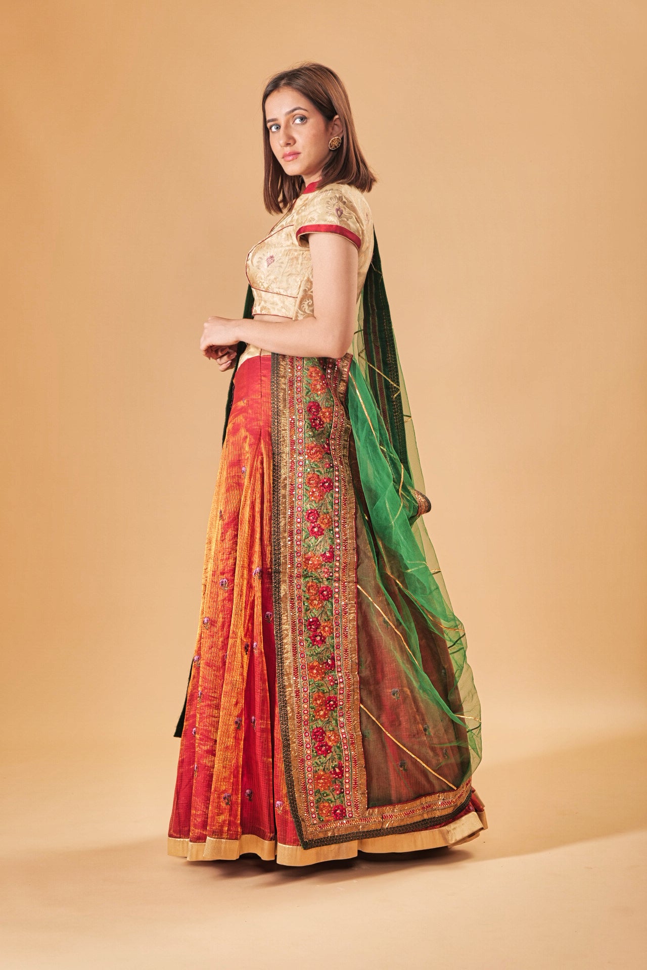 Gold Kin Khaab Indowestern blouse with Tissue silk Parsi work skirt and Soft net Gota and threadwork dupatta