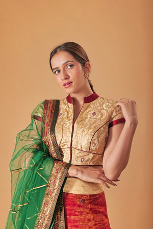 Gold Kin Khaab Indowestern blouse with Tissue silk Parsi work skirt and Soft net Gota and threadwork dupatta