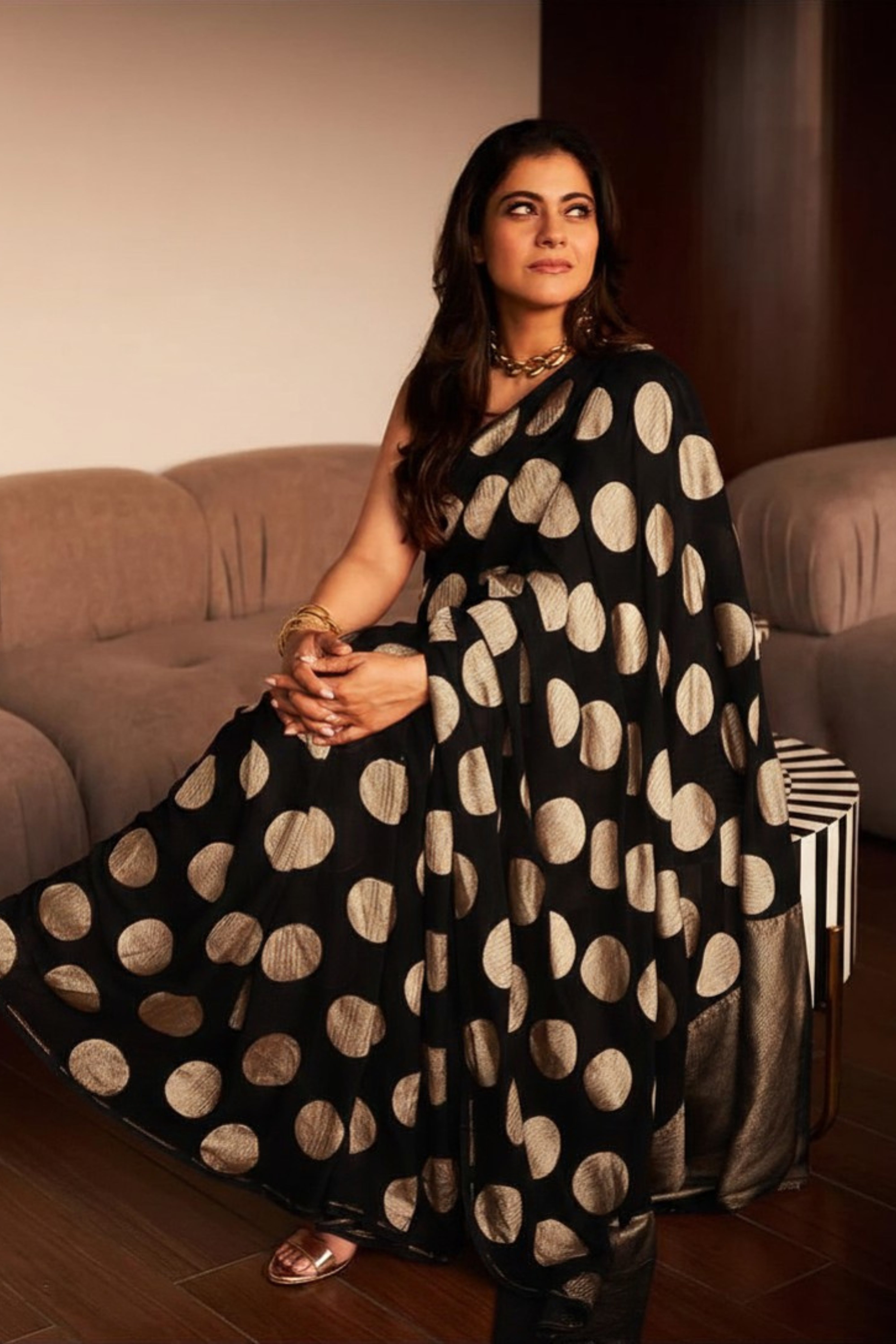 Celebrity Inspired Black & Gold Polka Dot Georgette Saree
