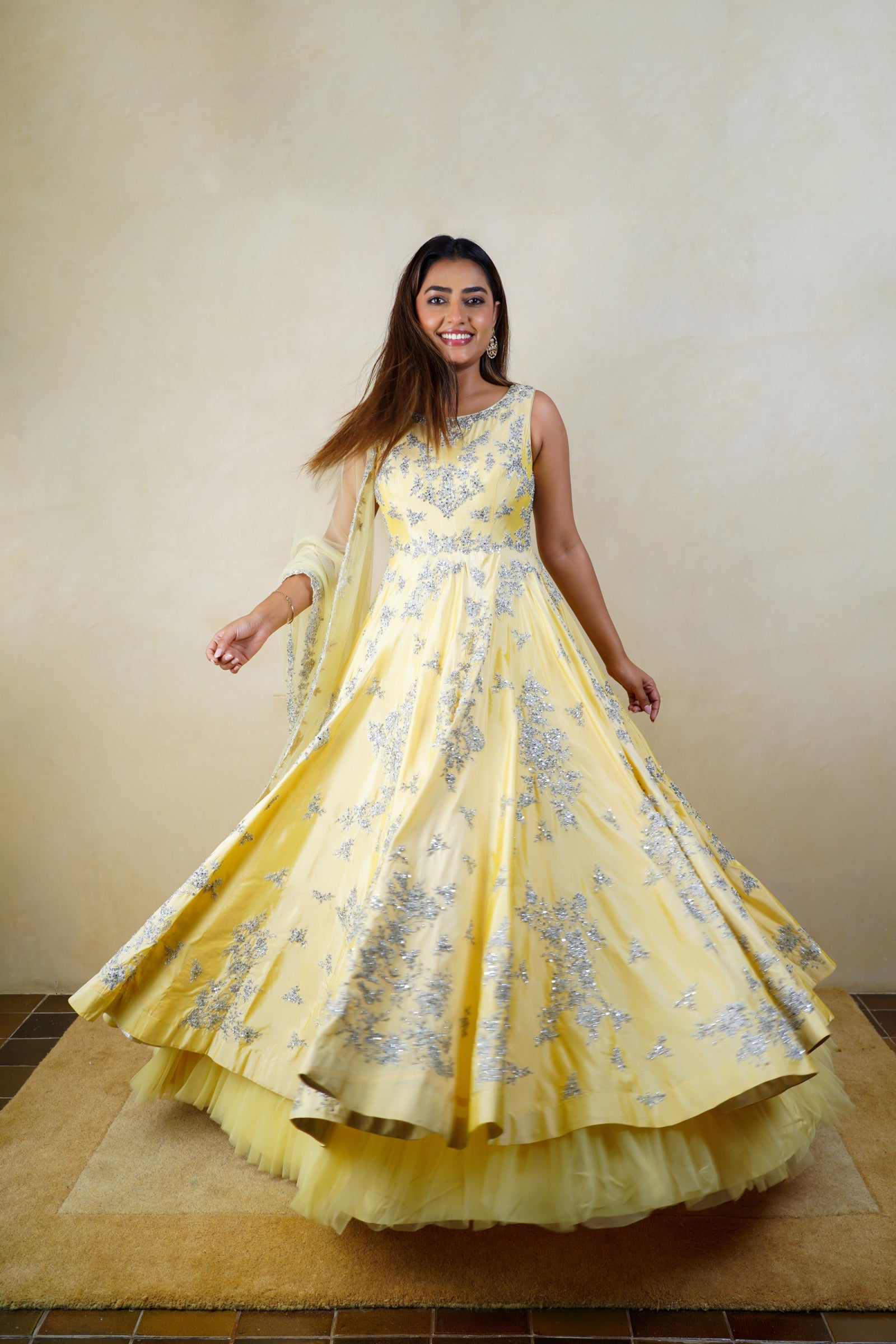 Creamy yellow silk heavy embroidered anarkali suit set