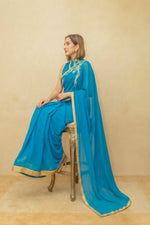 Peacock blue pre draped georgette saree and blouse set
