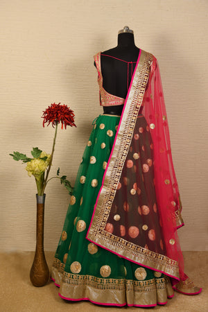 Green and rani pink gota lehenga